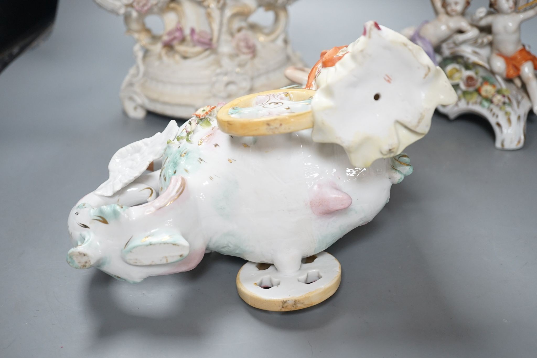 A French bisque centrepiece, Naples porcelain centrepiece and figural chariot, tallest 44cm